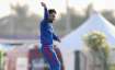 Afghanistan's Rashid Khan celebrates after taking the wicket of New Zealand's Martin Guptill during 