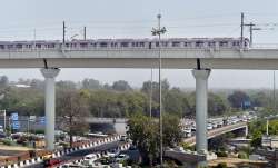New Delhi: A Metro train moves across the new Majlis Park