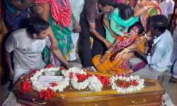 Family members of Samar Tikadar, one of the Indians