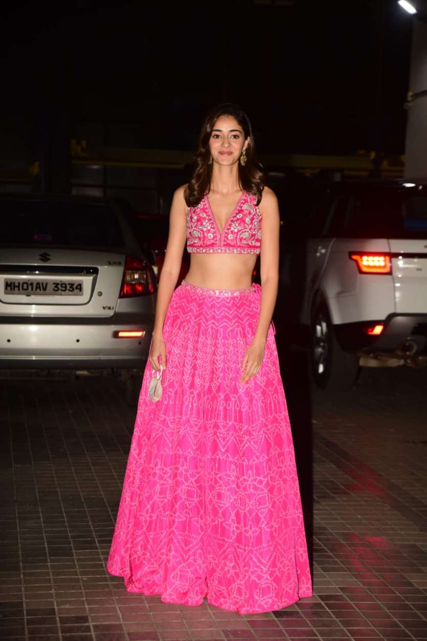 Look at that bright smile! Ananya Panday looked drop-dead gorgeous in her pink crop top and skirt that she wore on the occasion.