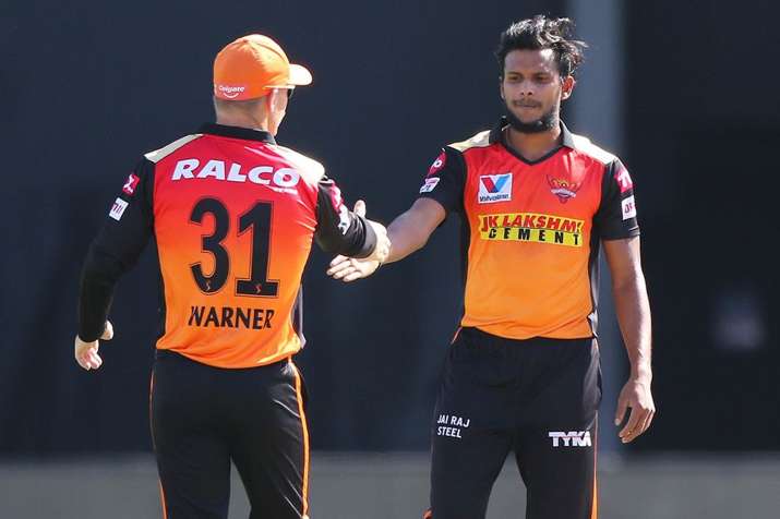 T Natarajan and David Warner.